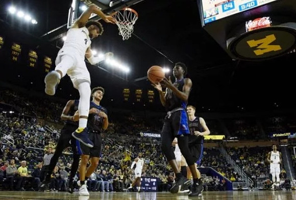 Isaiah Livers (4), Zavier Simpson (3), and Charles Matthews (1)