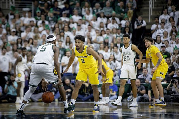 David DeJulius (0), Zavier Simpson (3), and Brandon Johns Jr. (23)