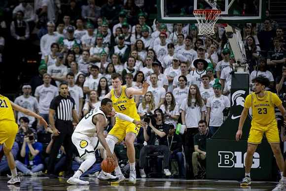 Franz Wagner (21), Jon Teske (15), and Brandon Johns Jr. (23)