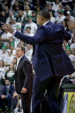 Michigan State Head Coach Tom Izzo and Juwan Howard