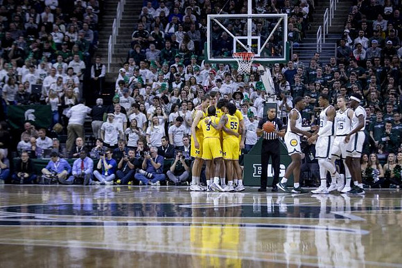 Franz Wagner (21), Jon Teske (15), Zavier Simpson (3), Eli Brooks (55), and Brandon Johns Jr. (23)