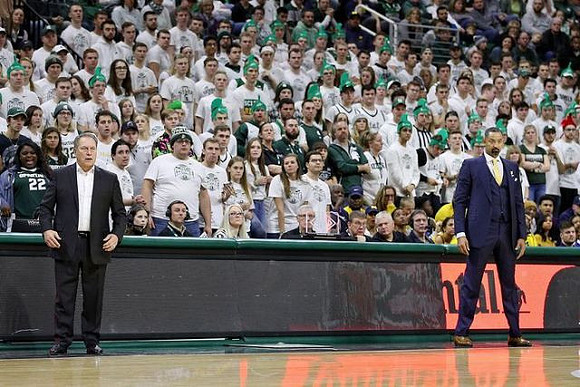 Michigan State Head Coach Tom Izzo and Juwan Howard