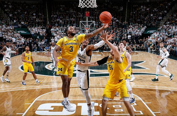 David DeJulius (0), Zavier Simpson (3), Austin Davis (51), and Colin Castleton (11)