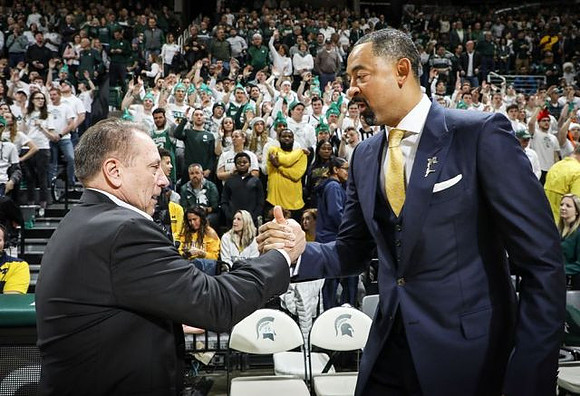 Michigan State Head Coach Tom Izzo and Juwan Howard
