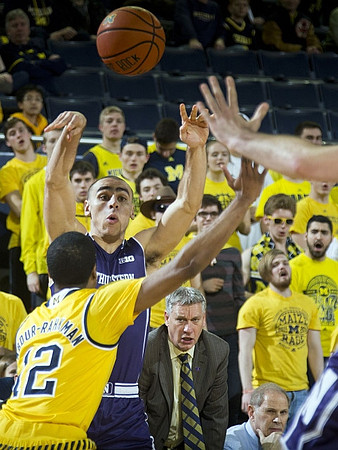 Muhammad-Ali Abdur-Rahkman (12) and Jeff Meyer