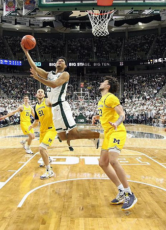 Franz Wagner (21), Austin Davis (51), and Brandon Johns Jr. (23)