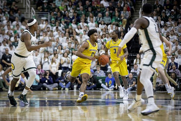 David DeJulius (0) and Zavier Simpson (3)