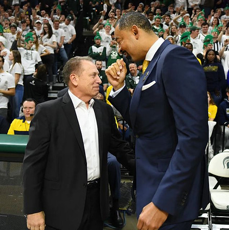 Michigan State Head Coach Tom Izzo and Juwan Howard