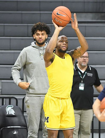 Isaiah Livers (2) and Zavier Simpson (3)