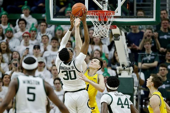 Colin Castleton (11) and Franz Wagner (21)