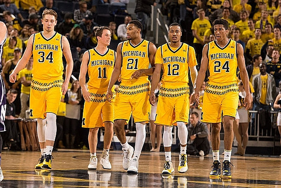 Mark Donnal (34), Andrew Dakich (11), Zak Irvin (21), Muhammad-Ali Abdur-Rahkman (12), and Aubrey Dawkins (24)