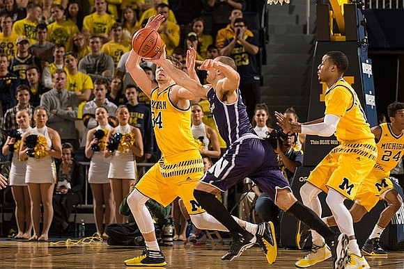 Mark Donnal (34), Muhammad-Ali Abdur-Rahkman (12), and Aubrey Dawkins (24)