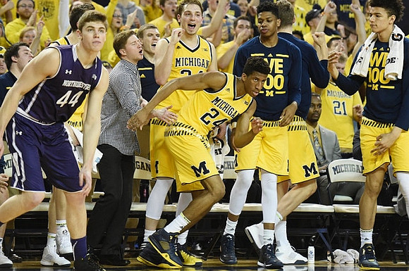Spike Albrecht (2), Mark Donnal (34), Aubrey Dawkins (24), Kameron Chatman (3), and D.J. Wilson (5)