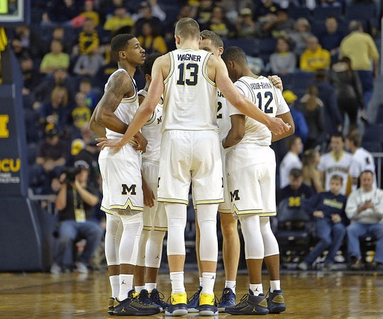 Charles Matthews (1), Moritz Wagner (13), and Muhammad-Ali Abdur-Rahkman (12)