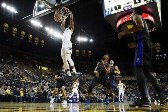 Charles Matthews (1), Eli Brooks (55), and Moritz Wagner (13)