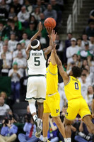 Brandon Johns Jr. (23) and David DeJulius (0)