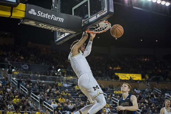 Isaiah Livers (4) and Moritz Wagner (13)