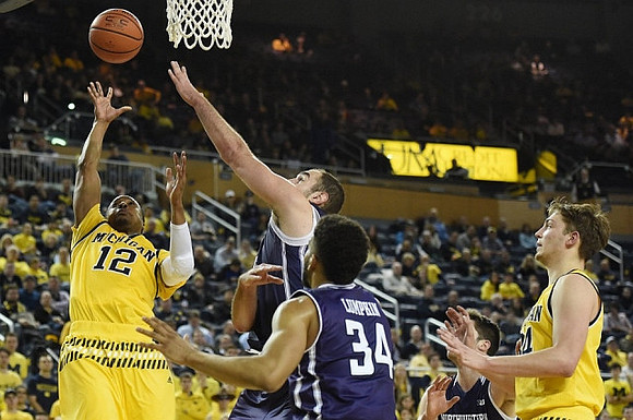 Muhammad-Ali Abdur-Rahkman (12) and Mark Donnal (34)