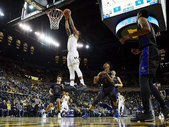 Charles Matthews (1), Eli Brooks (55), and Moritz Wagner (13)