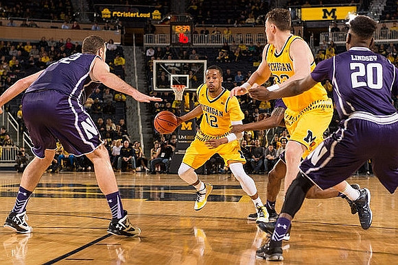 Muhammad-Ali Abdur-Rahkman (12) and Ricky Doyle (32)