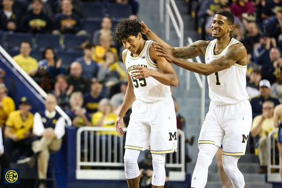 Eli Brooks (55) and Charles Matthews (1)