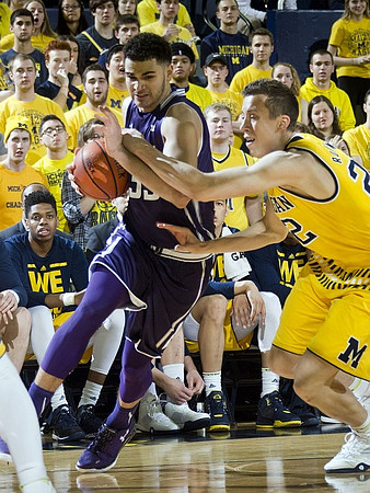 Kameron Chatman (3) and Duncan Robinson (22)