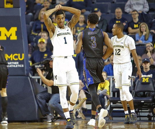 Charles Matthews (1) and Muhammad-Ali Abdur-Rahkman (12)