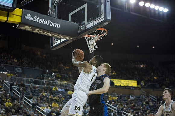 Charles Matthews (1) and Jon Teske (15)