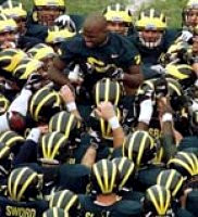 Eric Mayes (26) and Teammates