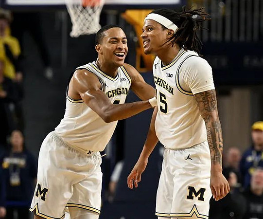 Nimari Burnett (4) and Rubin Jones (15)