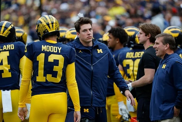 Jake Moody (13) and Cade McNamara (12)