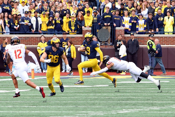 Luke Schoonmaker (86) and J.J. McCarthy (9)