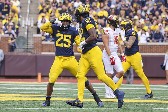 Junior Colson (25), Jaylen Harrell (32), and Braiden McGregor (17)