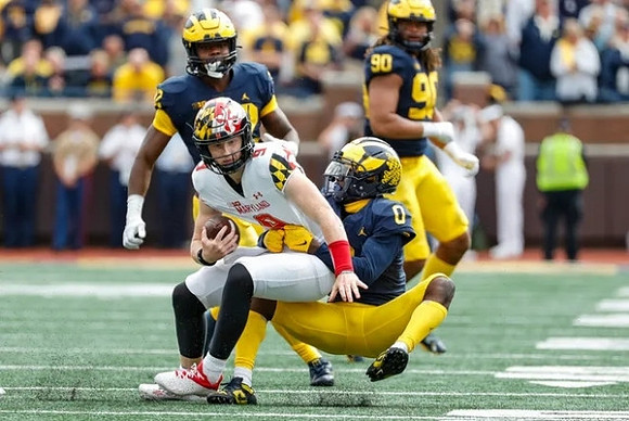 Mike Sainristil (0), Gemon Green (22), and Mike Morris (90)