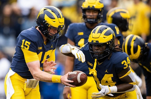 Alan Bowman (15) and Leon Franklin (34)