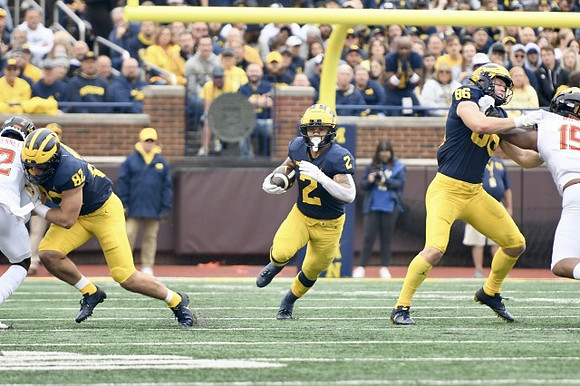 Max Bredeson (82), Blake Corum (2), and Luke Schoonmaker (86)