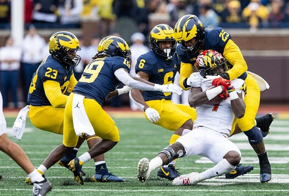 Michael Barrett (23), Rod Moore (19), R.J. Moten (6), and Junior Colson (25)