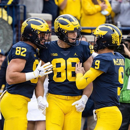 Max Bredeson (82), Luke Schoonmaker (86), and J.J. McCarthy (9)