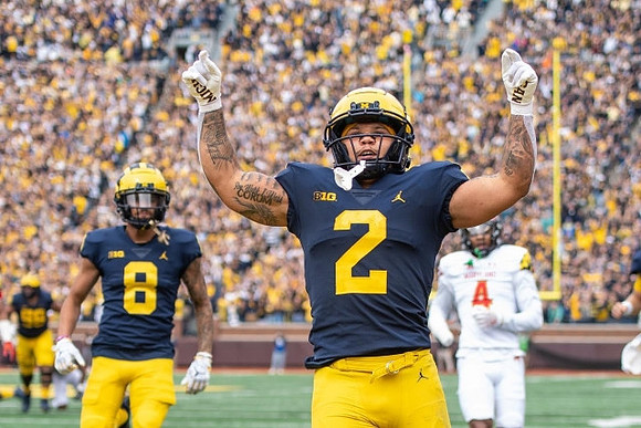 Ronnie Bell (8) and Blake Corum (2)