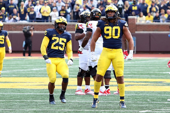 Junior Colson (25) and Mike Morris (90)