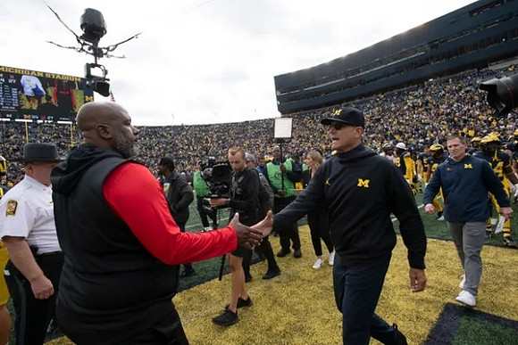 Maryland Head Coach Mike Locksley and Jim Harbaugh