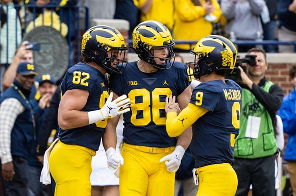 Max Bredeson (82), Luke Schoonmaker (86), and J.J. McCarthy (9)
