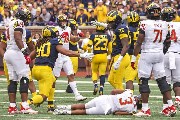 Mike Morris (90), Michael Barrett (23), Jaylen Harrell (32), and Mazi Smith (58)