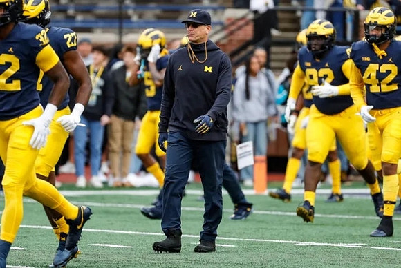Jim Harbaugh and Michigan Team