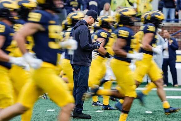 Jim Harbaugh and Michigan Team