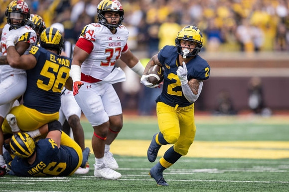 Giovanni El-Hadi (58), Ryan Hayes (76), and Blake Corum (2)