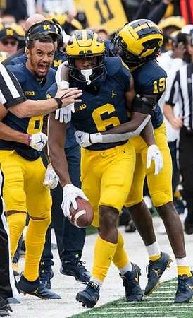 Ronnie Bell (8), R.J. Moten (6), and Rod Moore (19)