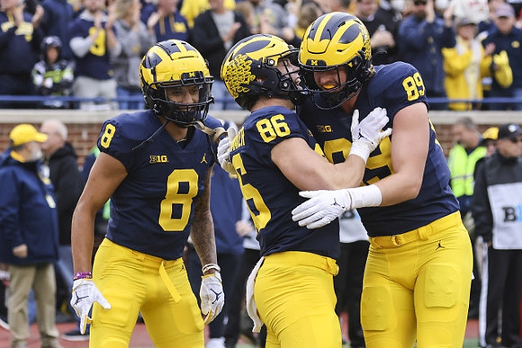 Ronnie Bell (8), Luke Schoonmaker (86), and Carter Selzer (89)