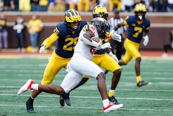 Junior Colson (25) and Makari Paige (7)