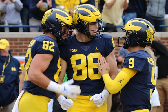 Max Bredeson (82), Luke Schoonmaker (86), and J.J. McCarthy (9)